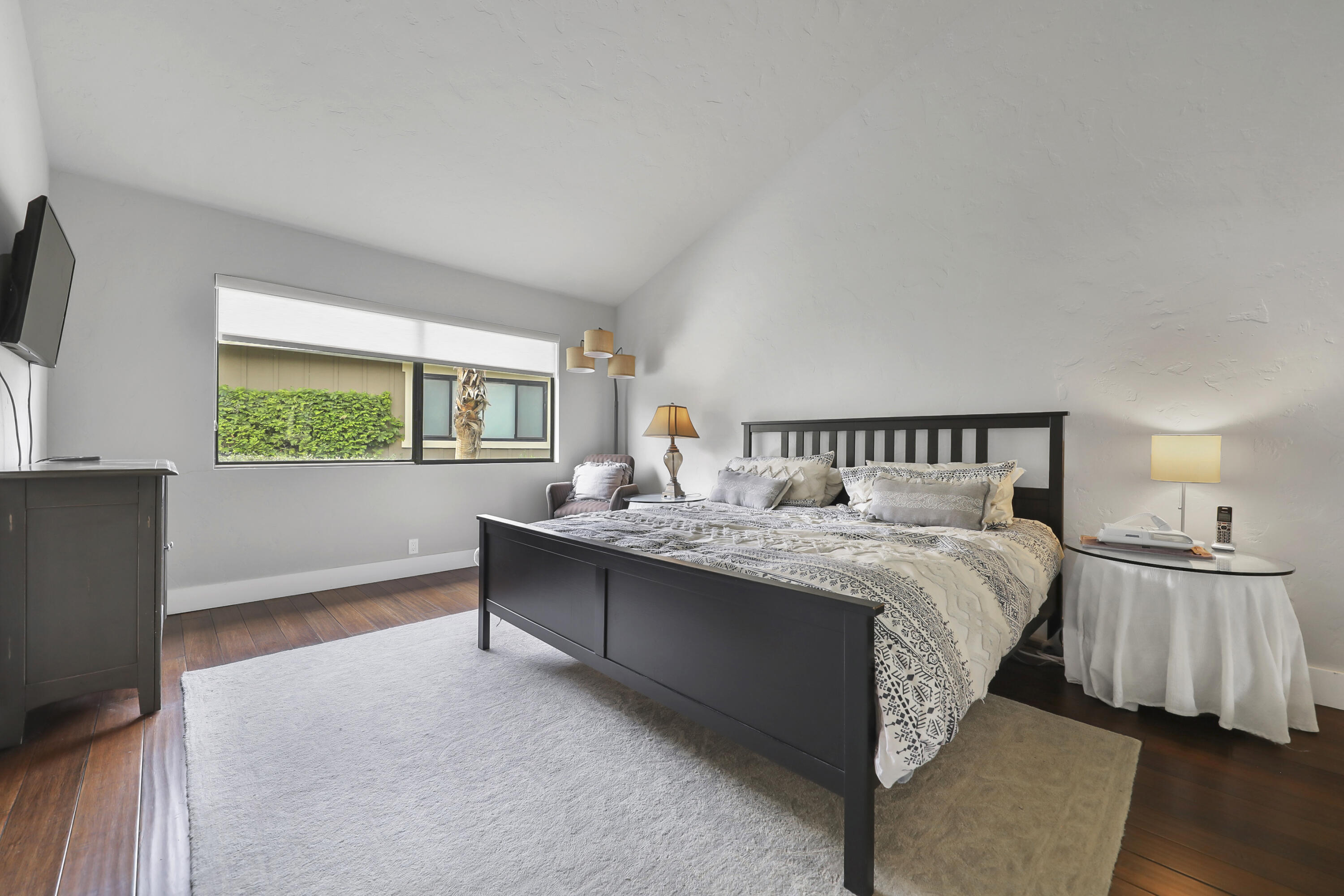 331 Red River Road Palm Desert, CA 92211 - Photo 19 of 56 a bedroom with a bed and window