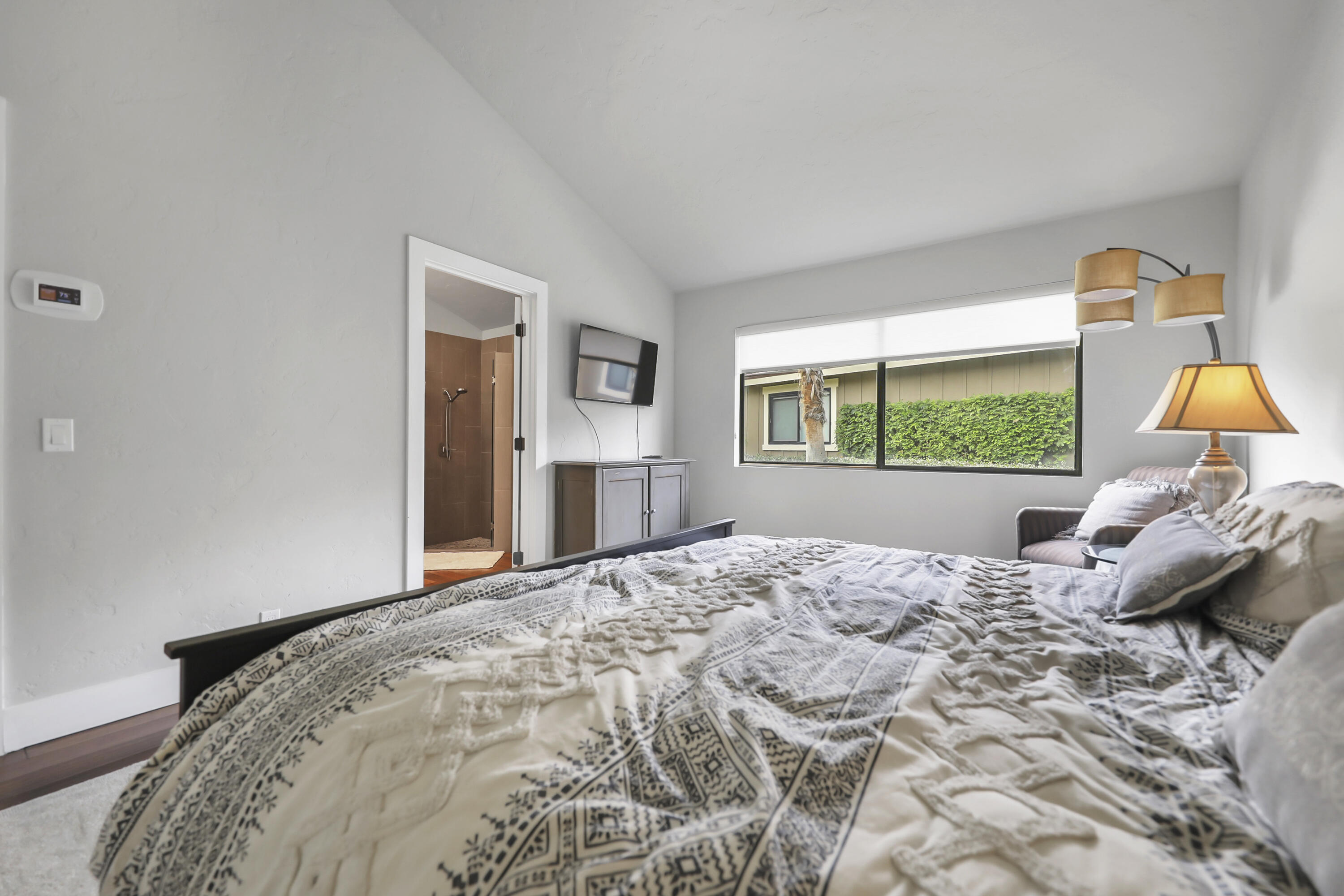 331 Red River Road Palm Desert, CA 92211 - Photo 20 of 56 a bedroom with a bed and window