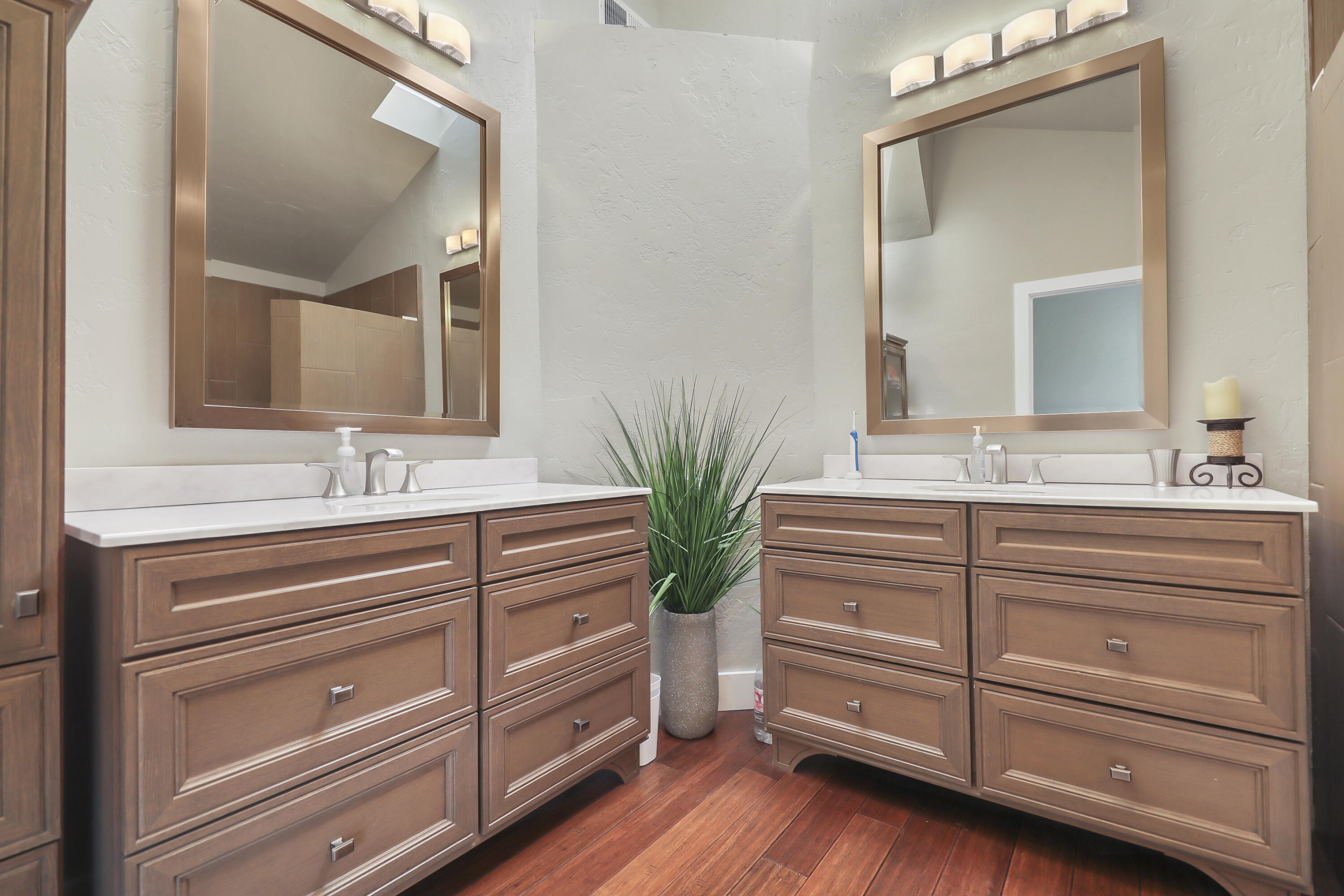 331 Red River Road Palm Desert, CA 92211 - Photo 21 of 56 a bathroom with a granite countertop sink and a mirror