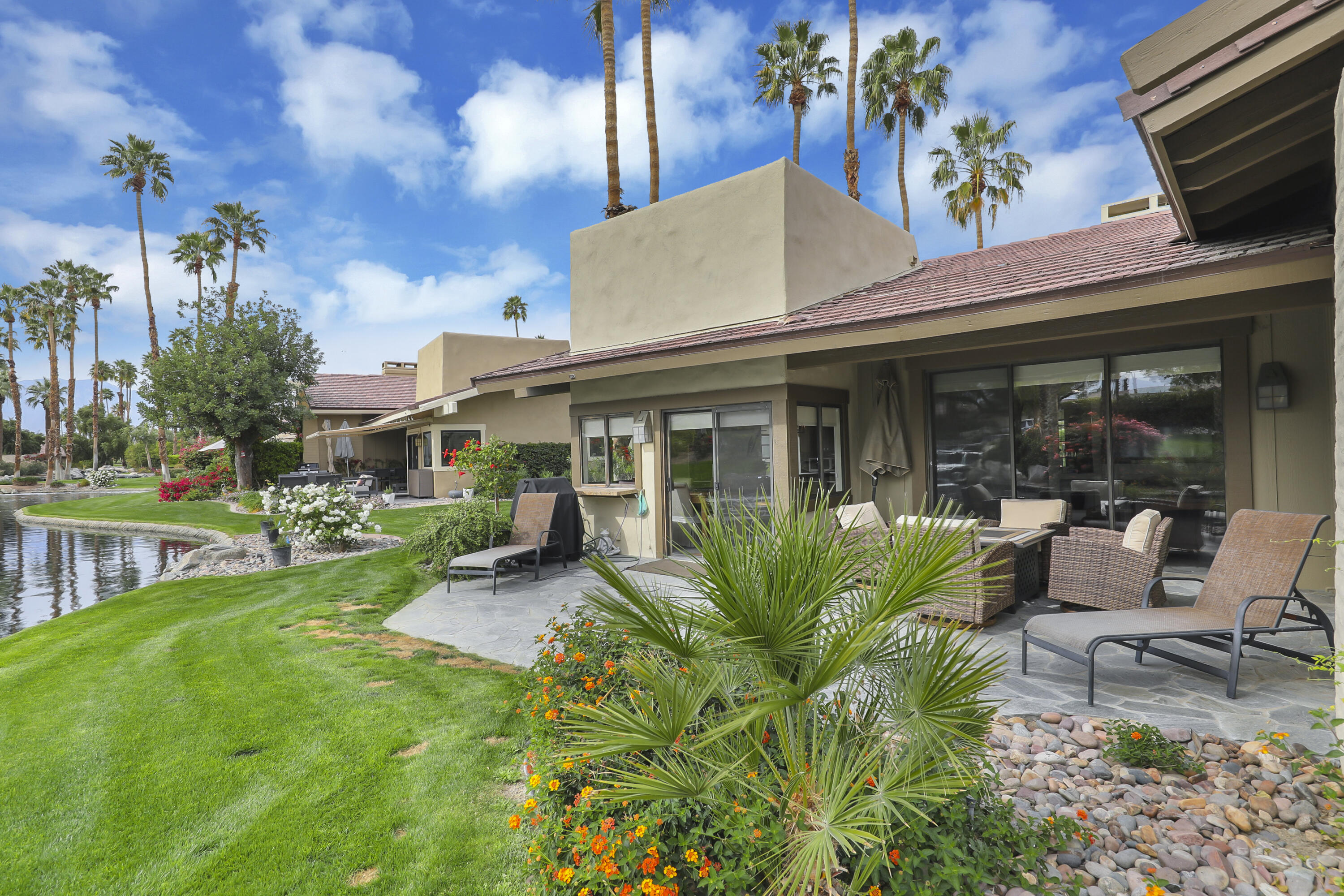 331 Red River Road Palm Desert, CA 92211 - Photo 24 of 56 a view of a house with backyard porch and sitting area