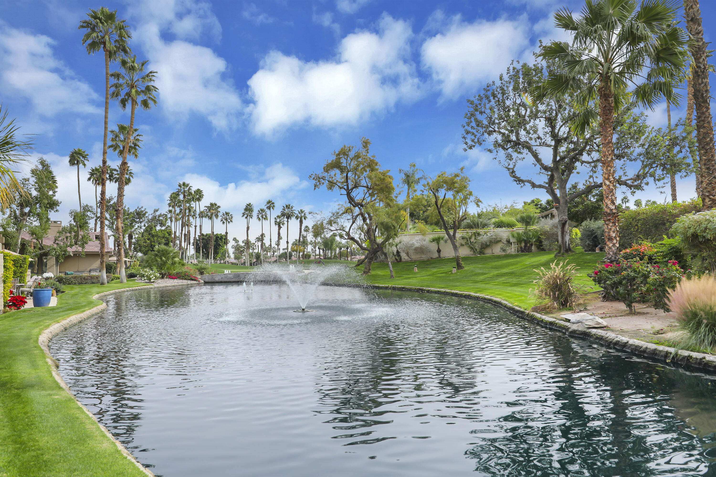 331 Red River Road Palm Desert, CA 92211 - Photo 26 of 56 a view of a lake with houses