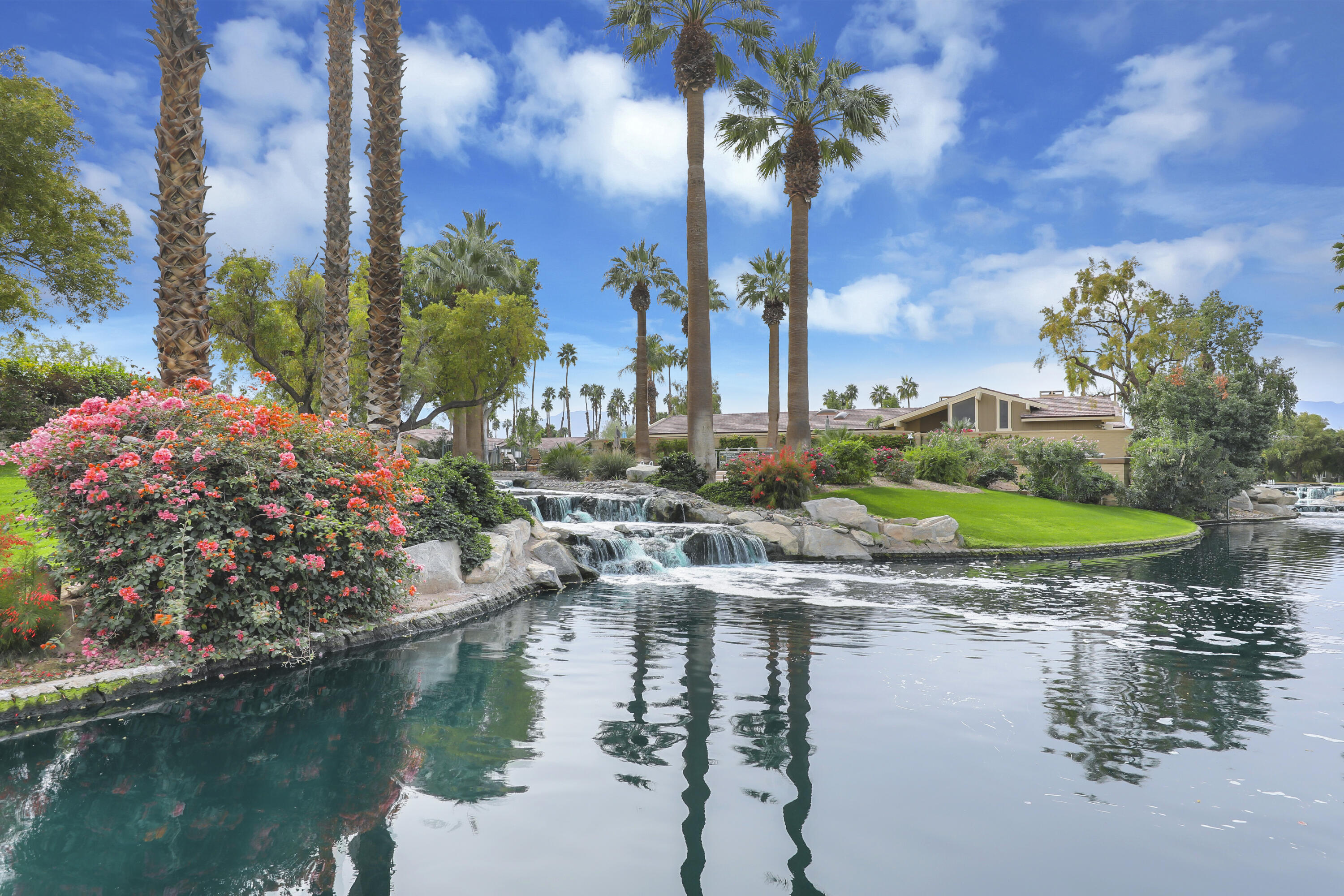 331 Red River Road Palm Desert, CA 92211 - Photo 27 of 56 a view of a lake with a house