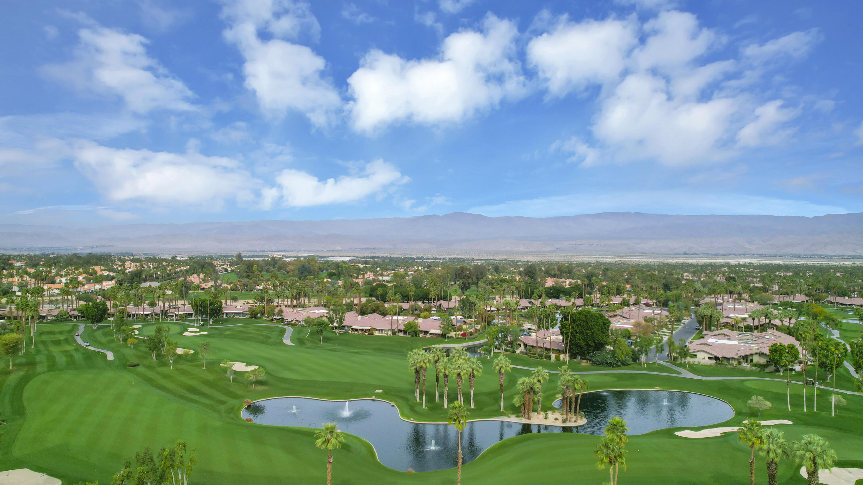 331 Red River Road Palm Desert, CA 92211 - Photo 31 of 56 an aerial view of residential houses with outdoor space and trees