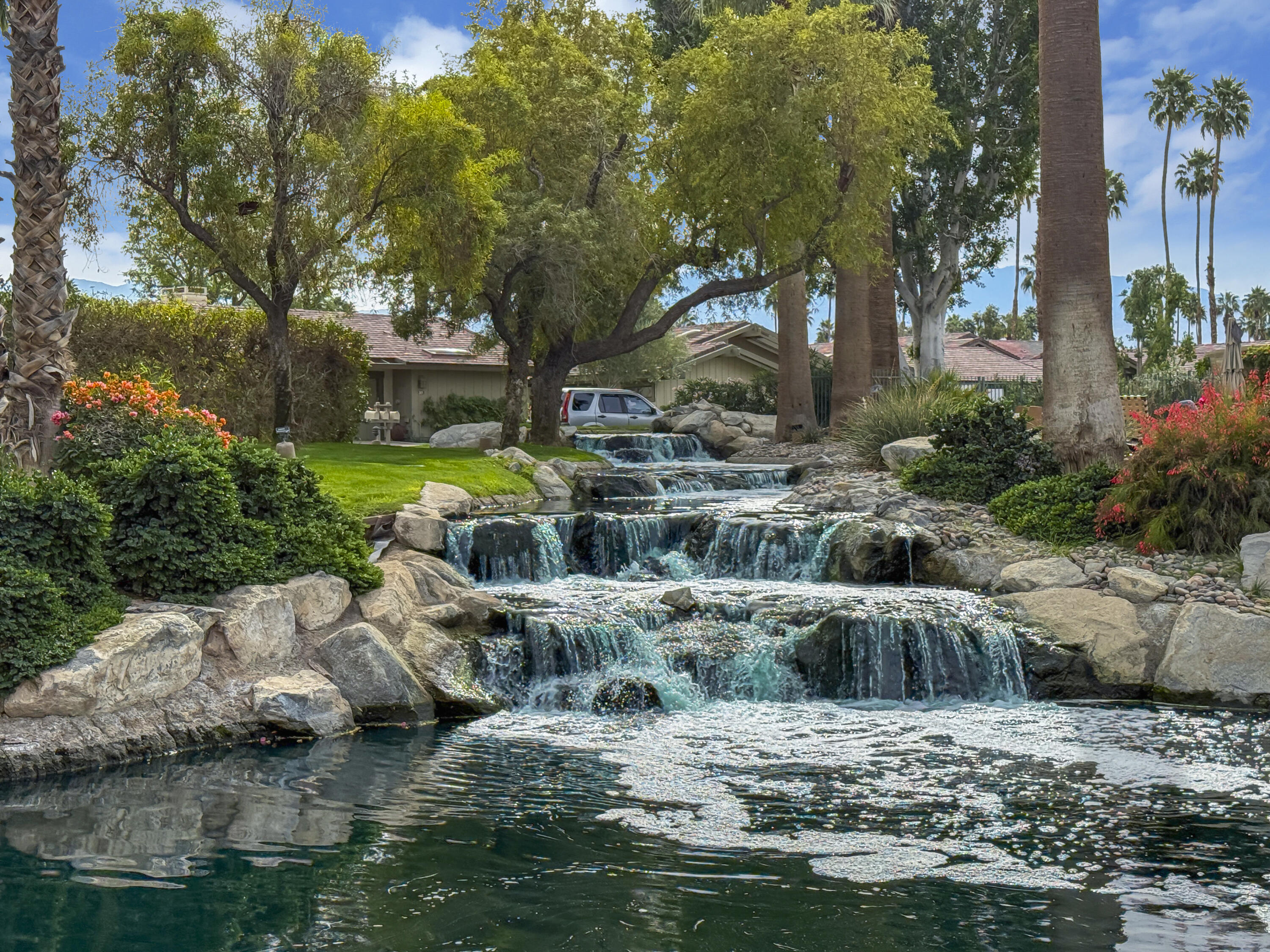 331 Red River Road Palm Desert, CA 92211 - Photo 36 of 56 a view of swimming pool with a patio and plants