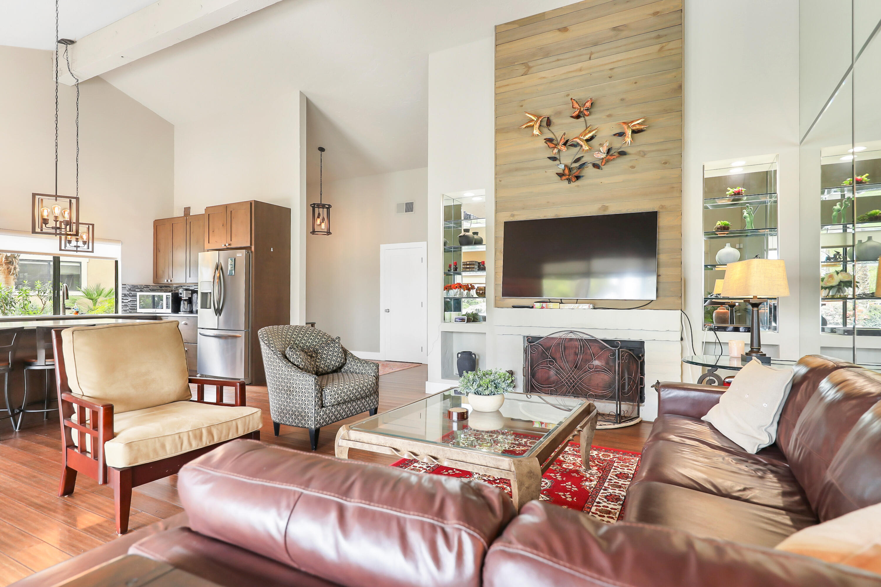 331 Red River Road Palm Desert, CA 92211 - Photo 8 of 56 a living room with furniture and a fireplace