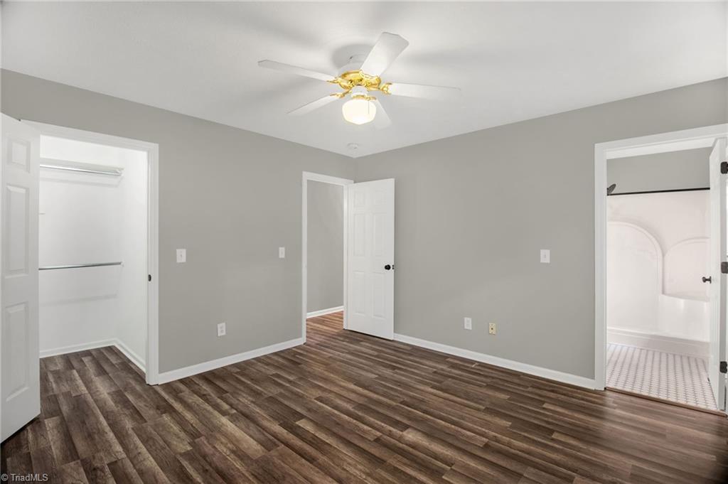 7511 McGee Road Rural Hall, NC 27045 - Photo 14 of 40 Primary Bedroom with walkin closet & updated bathroom