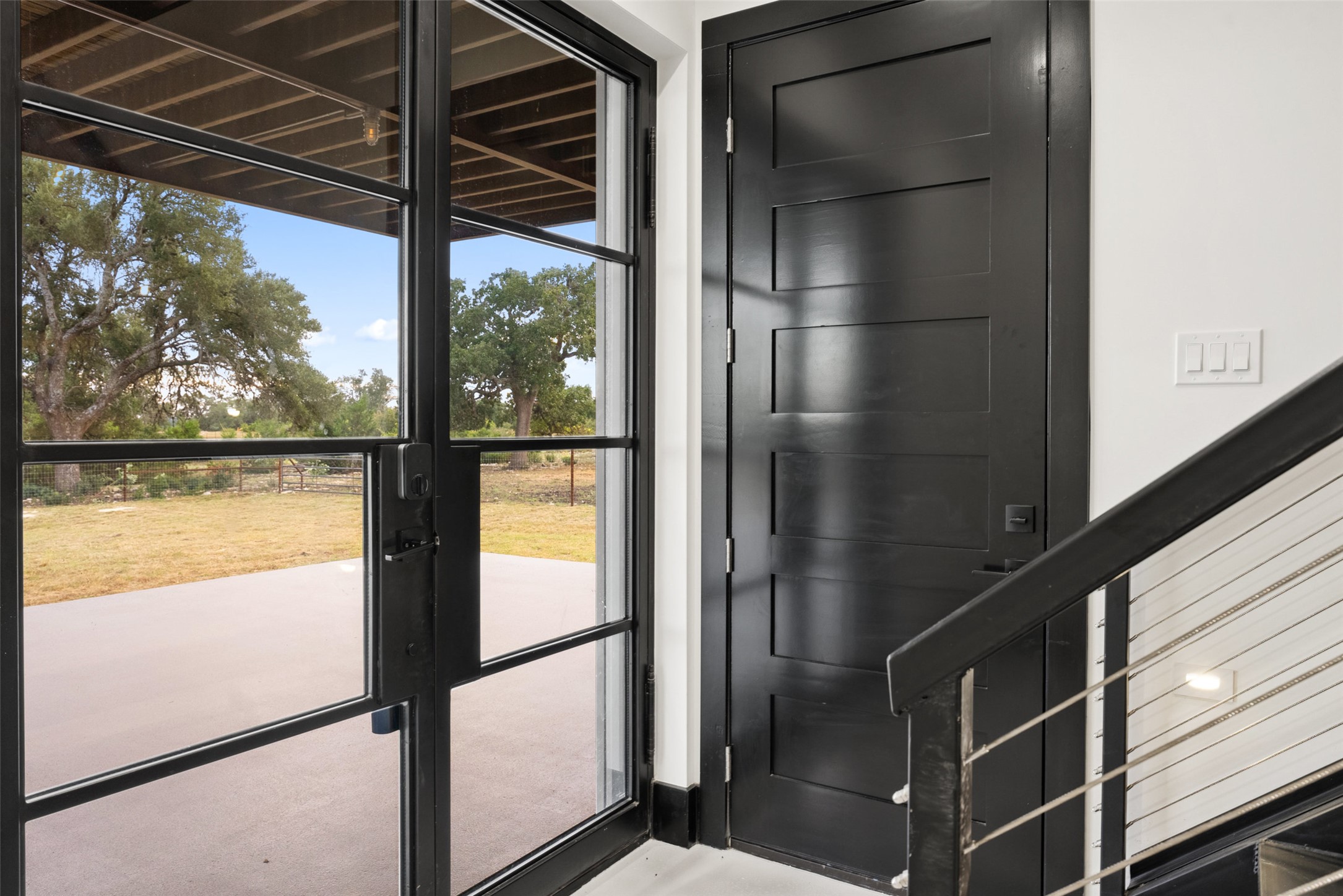 561 Broken Bit Trail Dripping Springs, TX 78620 - Photo 18 of 40 View of doorway to outside