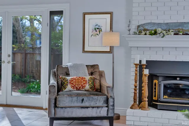 a view of a hallway to rooms and stairs
