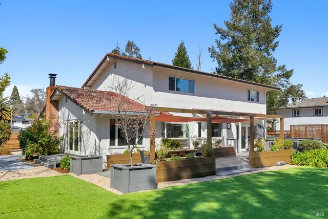 a front view of a house with garage