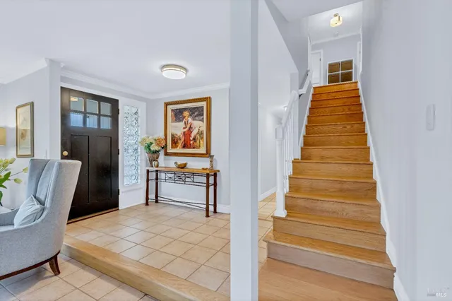 a bedroom with a bed and a table