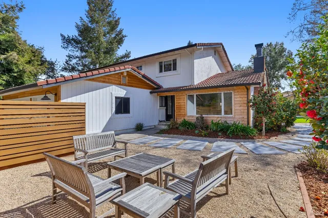 a view of a kitchen with a stove and a window