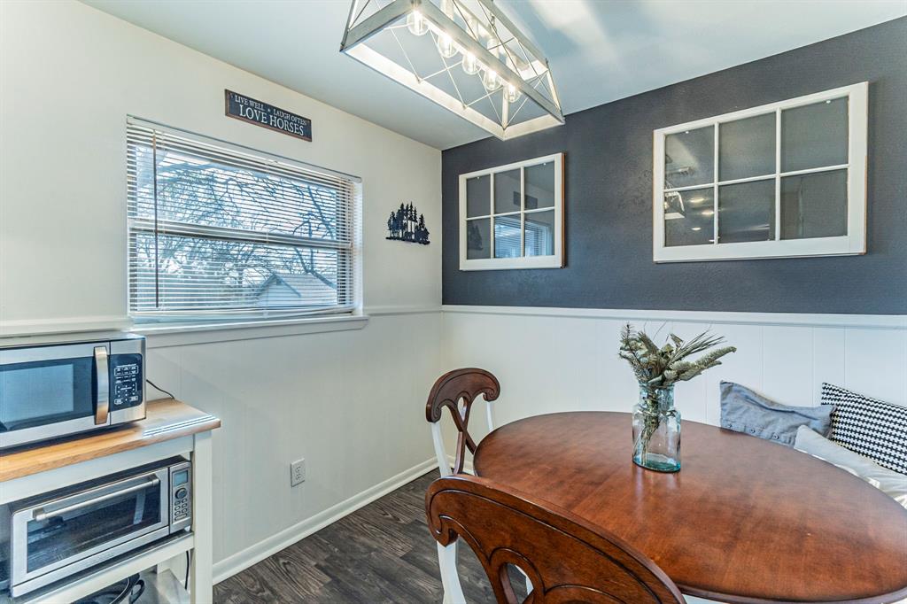 708 North Stewart Street Azle, TX 76020 - Photo 8 of 25 Bright and cozy breakfast nook with built-in charm, perfect for morning coffee or casual meals.