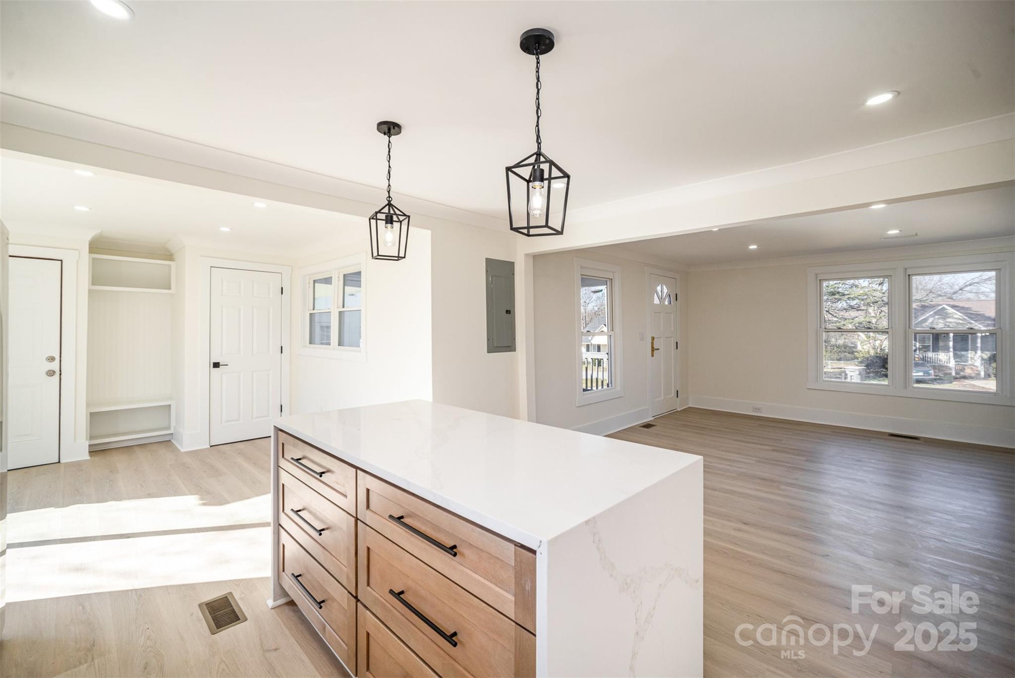 922 Grace Avenue Kannapolis, NC 28083 - Photo 12 of 27 a kitchen with a stove and a wooden floor