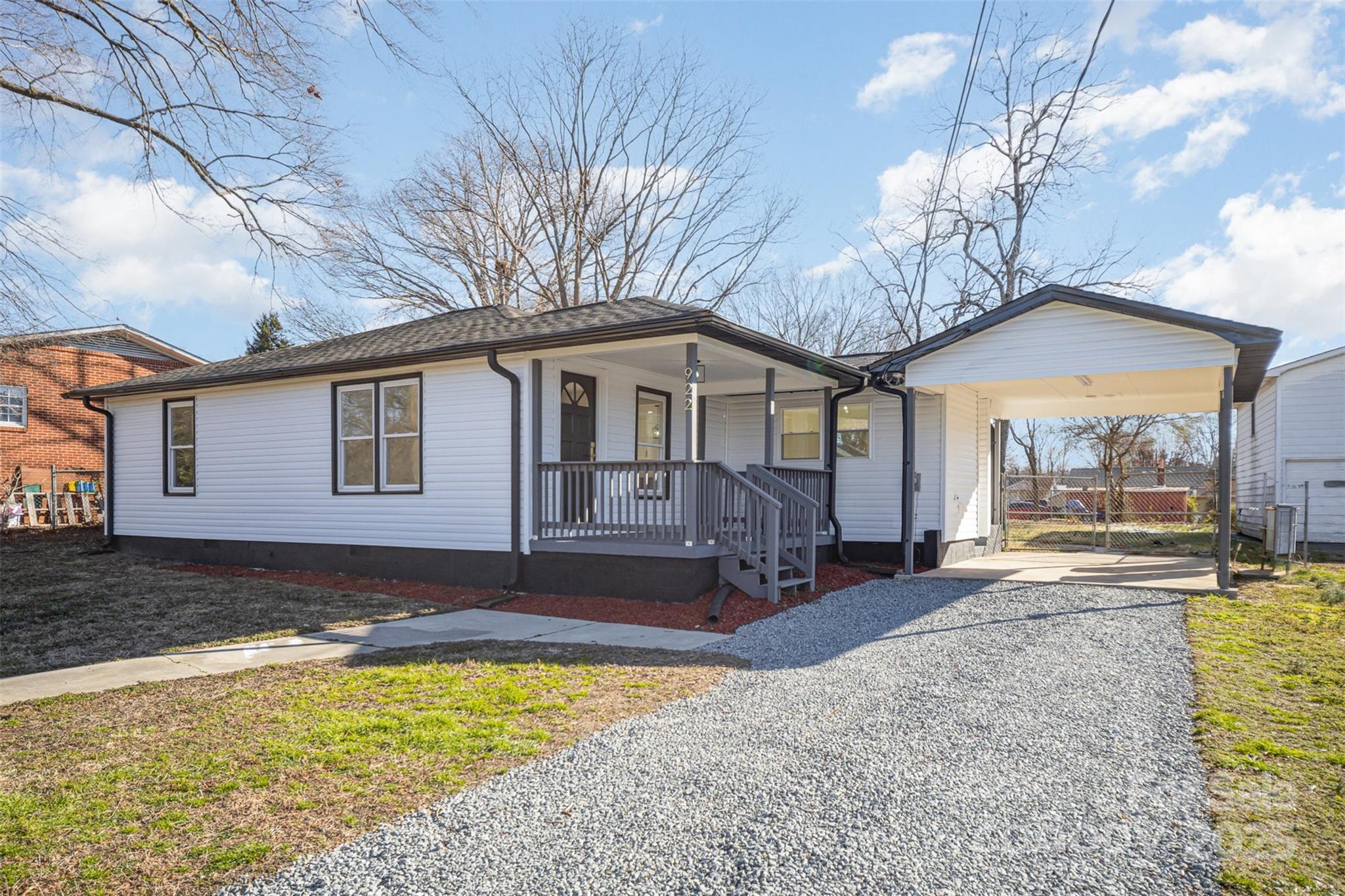 922 Grace Avenue Kannapolis, NC 28083 - Photo 2 of 27 a view of a house with a patio and a yard