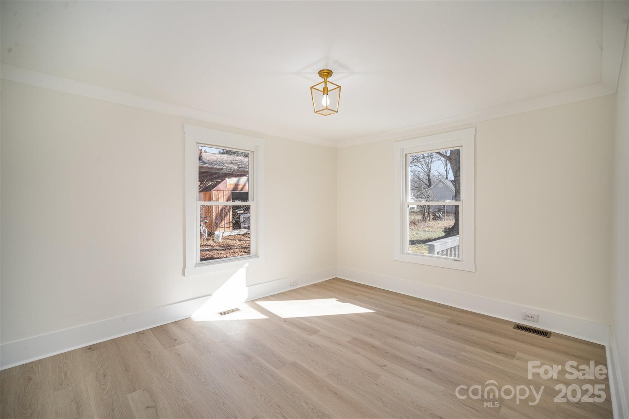 922 Grace Avenue Kannapolis, NC 28083 - Photo 22 of 27 an empty room with windows