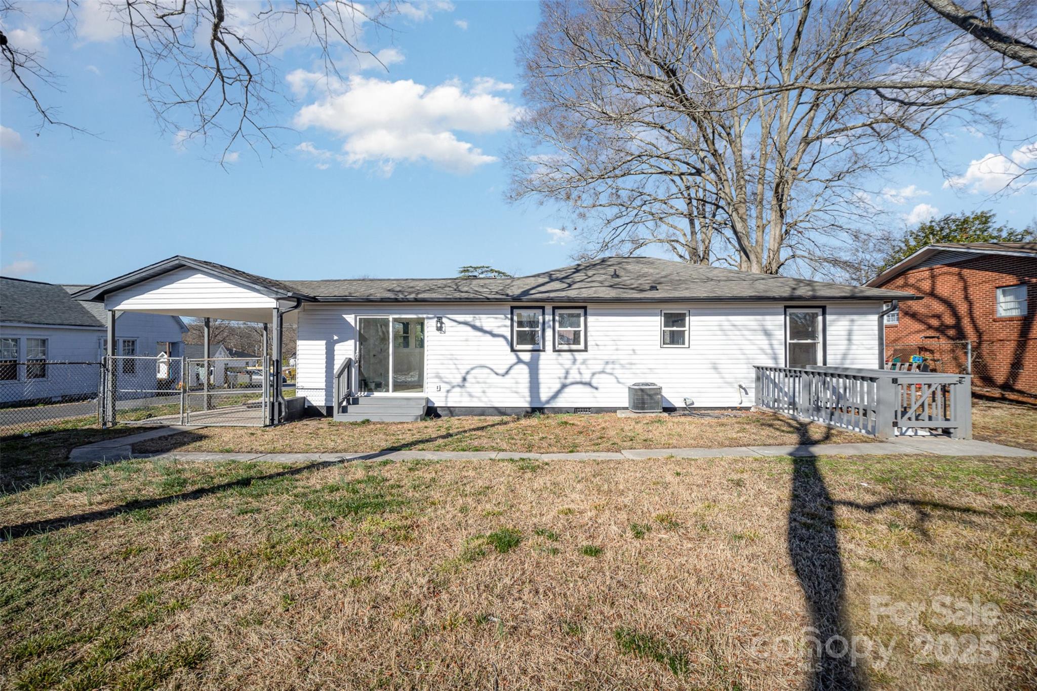 922 Grace Avenue Kannapolis, NC 28083 - Photo 24 of 27 a house view with pool and outdoor seating