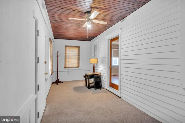 a view of a livingroom with furniture