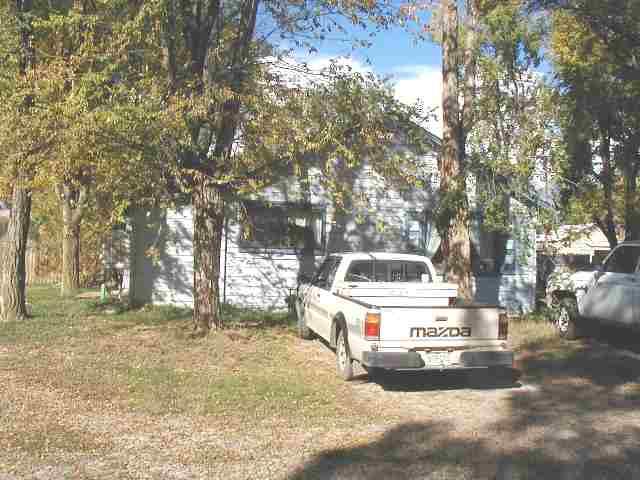 236 West 4th Street Rifle, CO 81650 - Photo 4 of 4 a view of a white house in front of a house