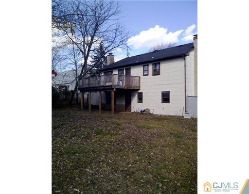 62 Meadow Road Edison, NJ 08817 - Photo 13 of 14 a view of a house with a yard