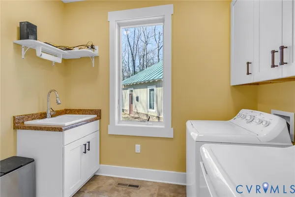 a utility room with dryer and washer