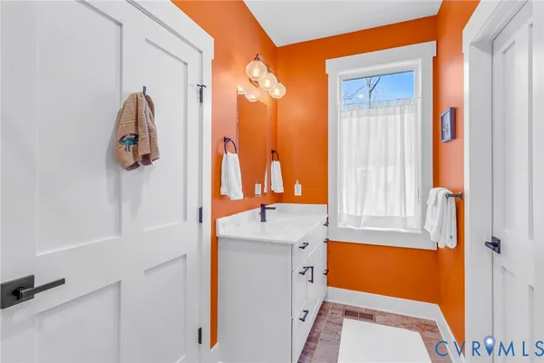 a view of a room with rack on the wall