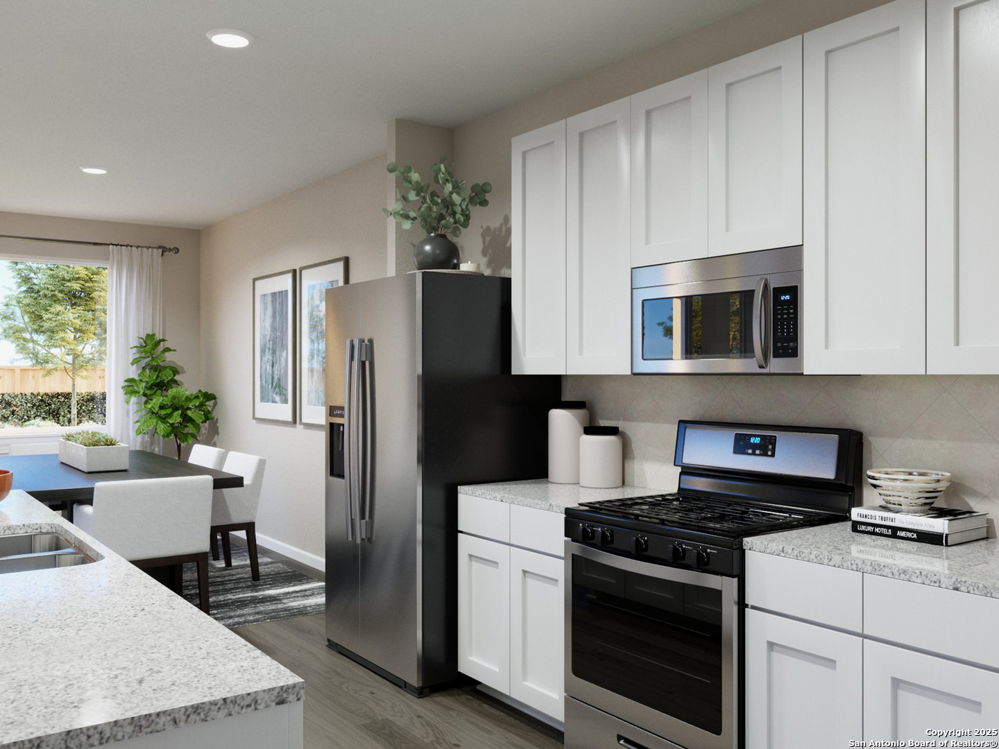 11103 Luckenbach Loop Converse, TX 78109 - Photo 12 of 28 a kitchen with a stove and a refrigerator
