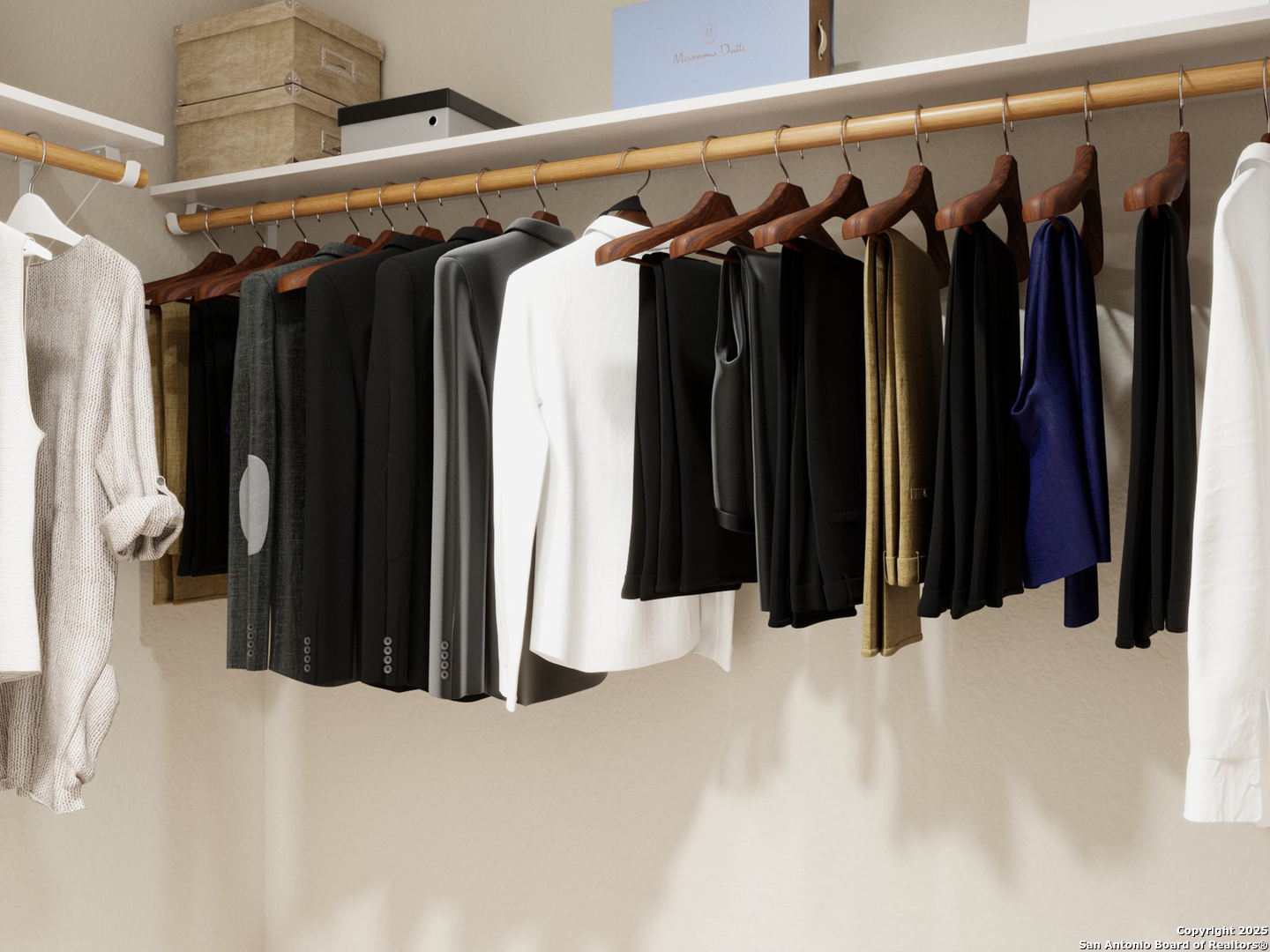 11103 Luckenbach Loop Converse, TX 78109 - Photo 17 of 28 a view of walk in closet with clothes