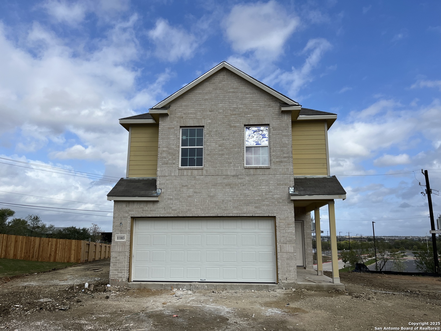 11103 Luckenbach Loop Converse, TX 78109 - Photo 2 of 28 a front view of a house with a yard