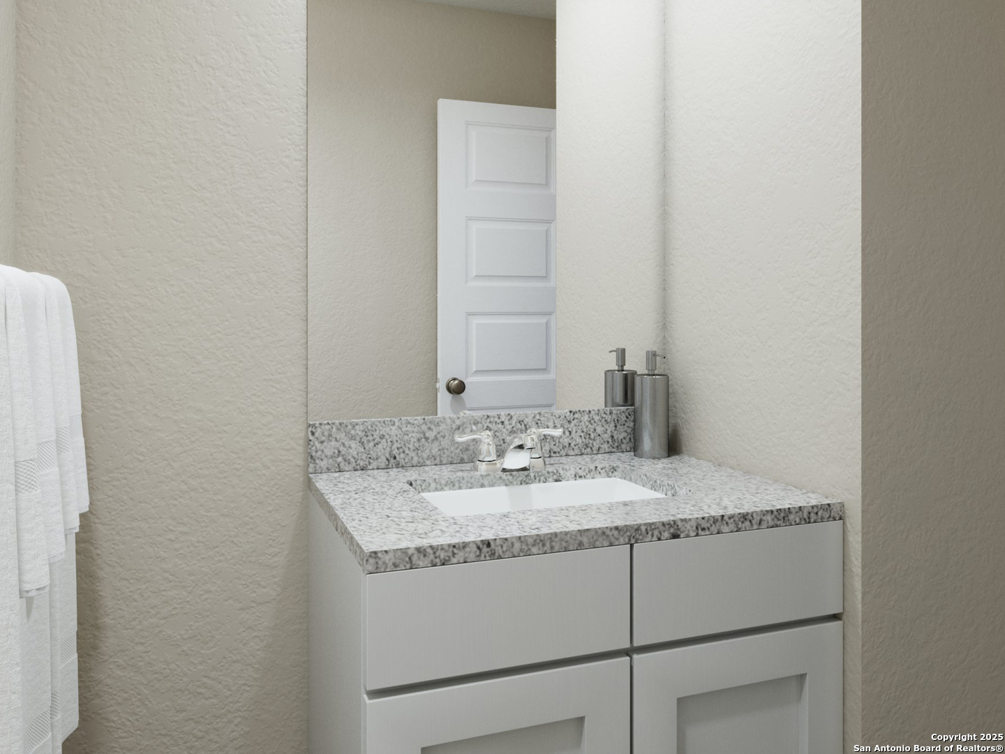 11103 Luckenbach Loop Converse, TX 78109 - Photo 23 of 28 a bathroom with a granite countertop sink and a mirror
