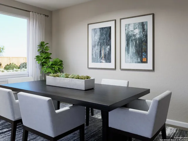 a living room with furniture and large window