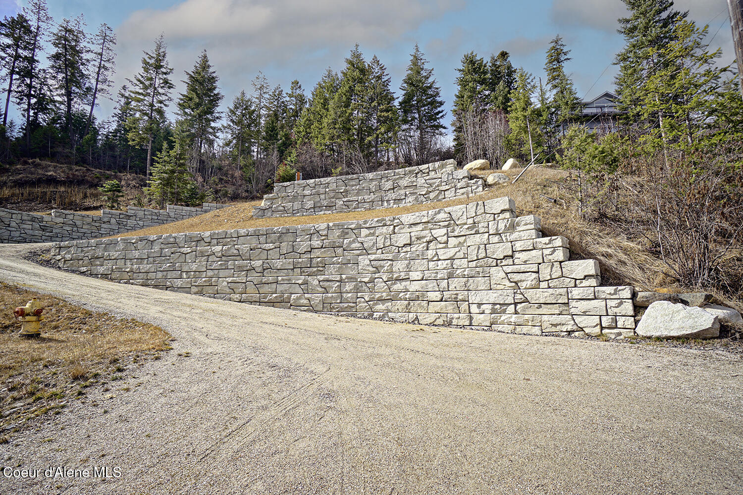 16882 East Hudson Bay Road Bayview, ID 83803 - Photo 7 of 13 Engineered Retaining Wall