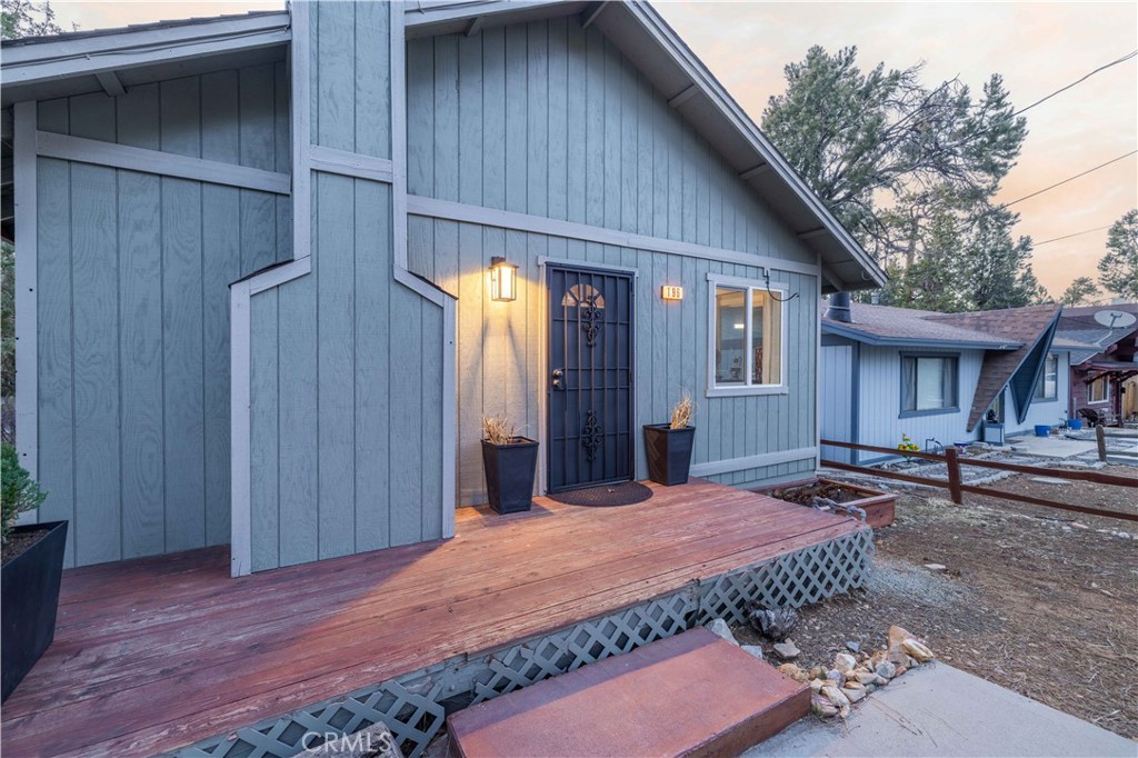 196 Sunset Lane Sugarloaf, CA 92386 - Photo 5 of 26 a view of a house with backyard and sitting area