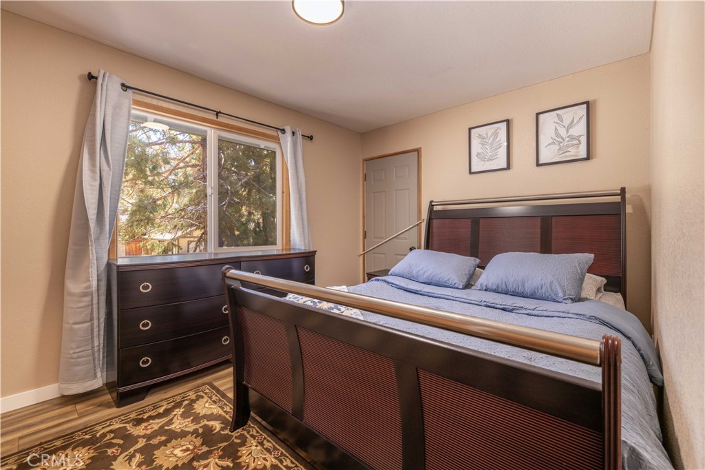 196 Sunset Lane Sugarloaf, CA 92386 - Photo 10 of 26 a room with a bed and a window