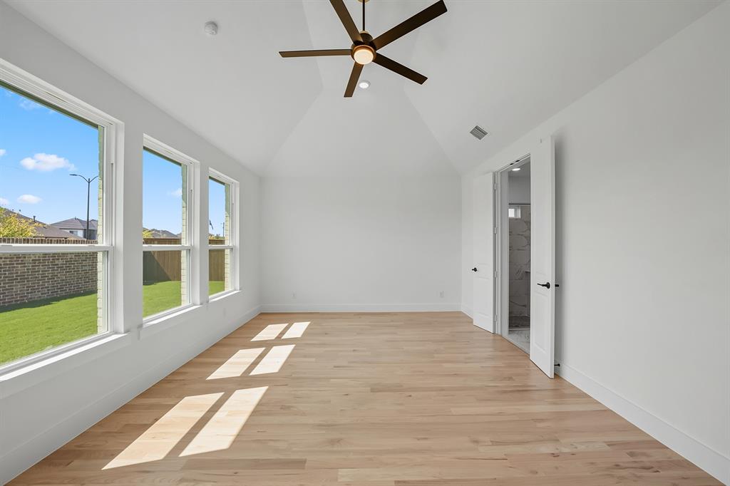 587 Mayfair Lane Frisco, TX 75033 - Photo 18 of 37 a view of an empty room with a window