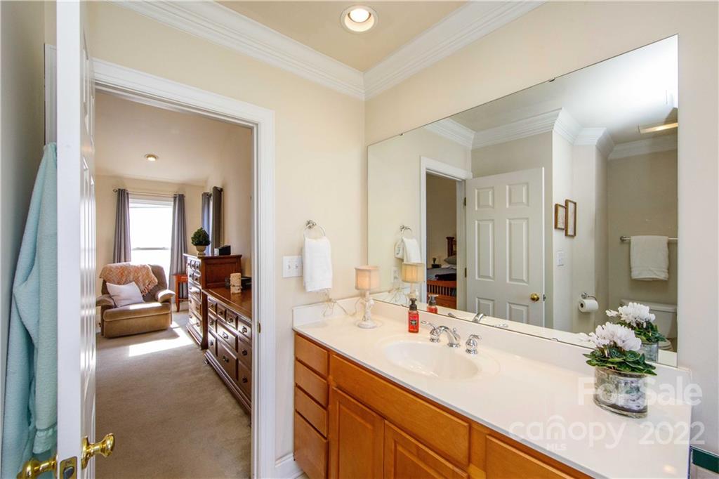 3200 Dublin Road Charlotte, NC 28208 - Photo 26 of 48 a en suite bathroom with double sink and a large mirror