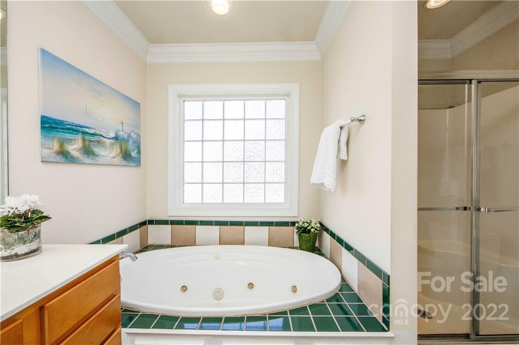 3200 Dublin Road Charlotte, NC 28208 - Photo 28 of 48 a bathroom with a tub and shower
