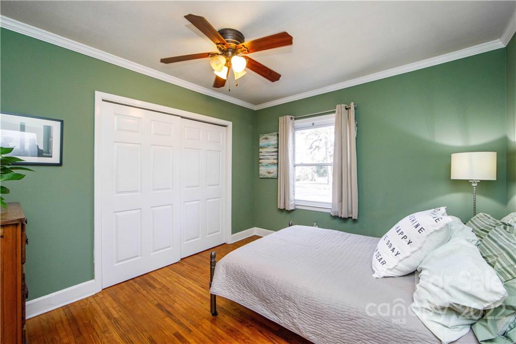 3200 Dublin Road Charlotte, NC 28208 - Photo 31 of 48 a bedroom with a bed and a window