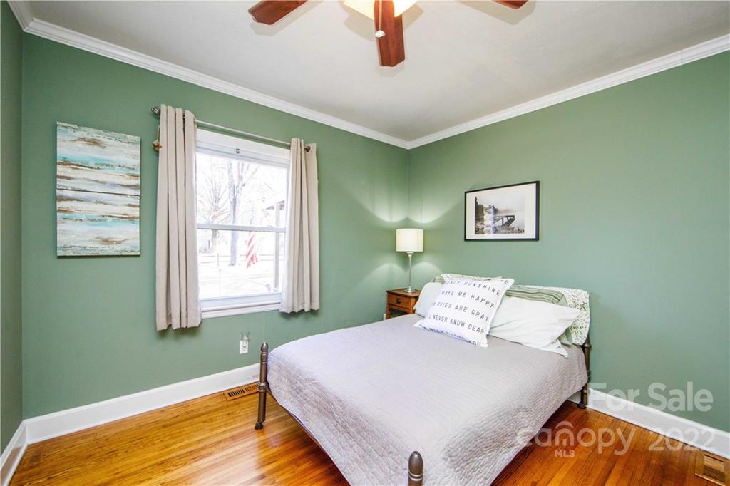 3200 Dublin Road Charlotte, NC 28208 - Photo 32 of 48 a bedroom with a bed and a window