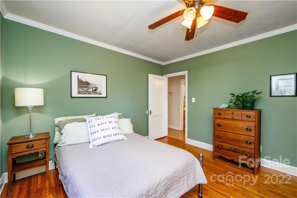3200 Dublin Road Charlotte, NC 28208 - Photo 33 of 48 a bedroom with a bed and a dresser