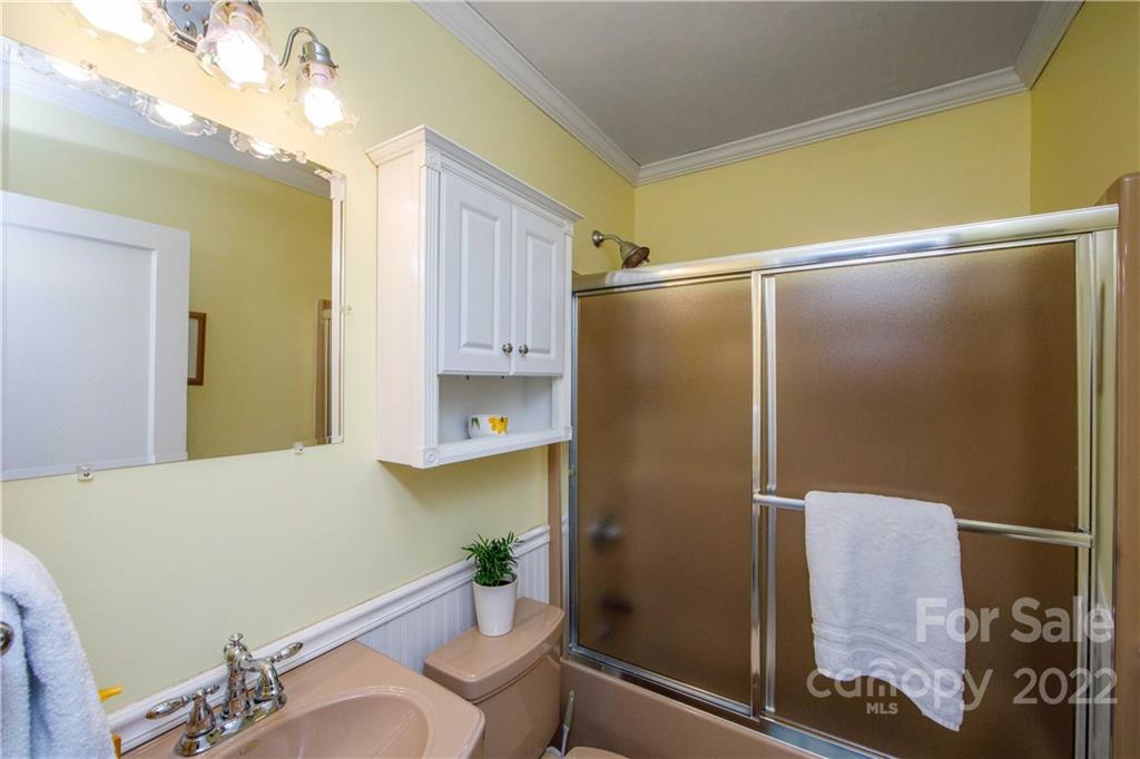3200 Dublin Road Charlotte, NC 28208 - Photo 34 of 48 a bathroom with a shower and a sink