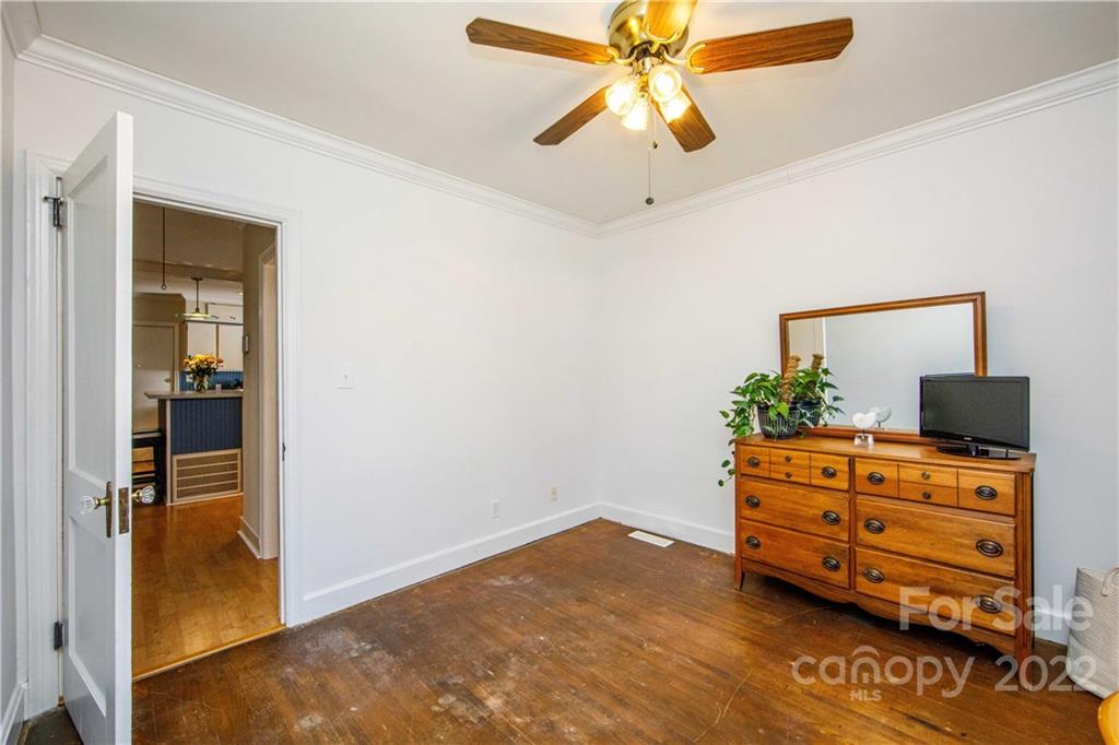3200 Dublin Road Charlotte, NC 28208 - Photo 35 of 48 a room with dresser and mirror