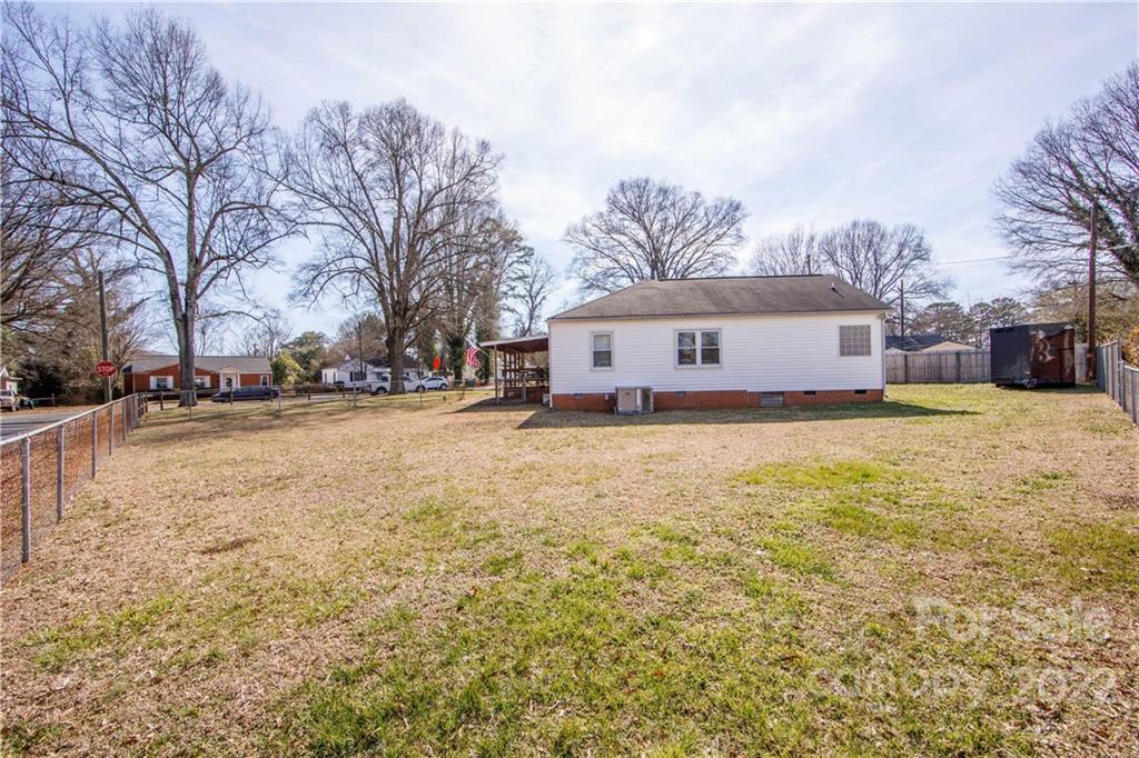 3200 Dublin Road Charlotte, NC 28208 - Photo 48 of 48 a view of a white house with a yard