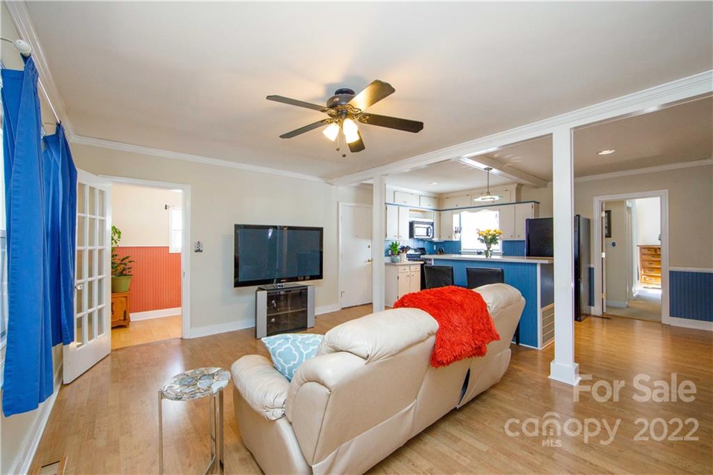 3200 Dublin Road Charlotte, NC 28208 - Photo 10 of 48 a living room with furniture and a flat screen tv