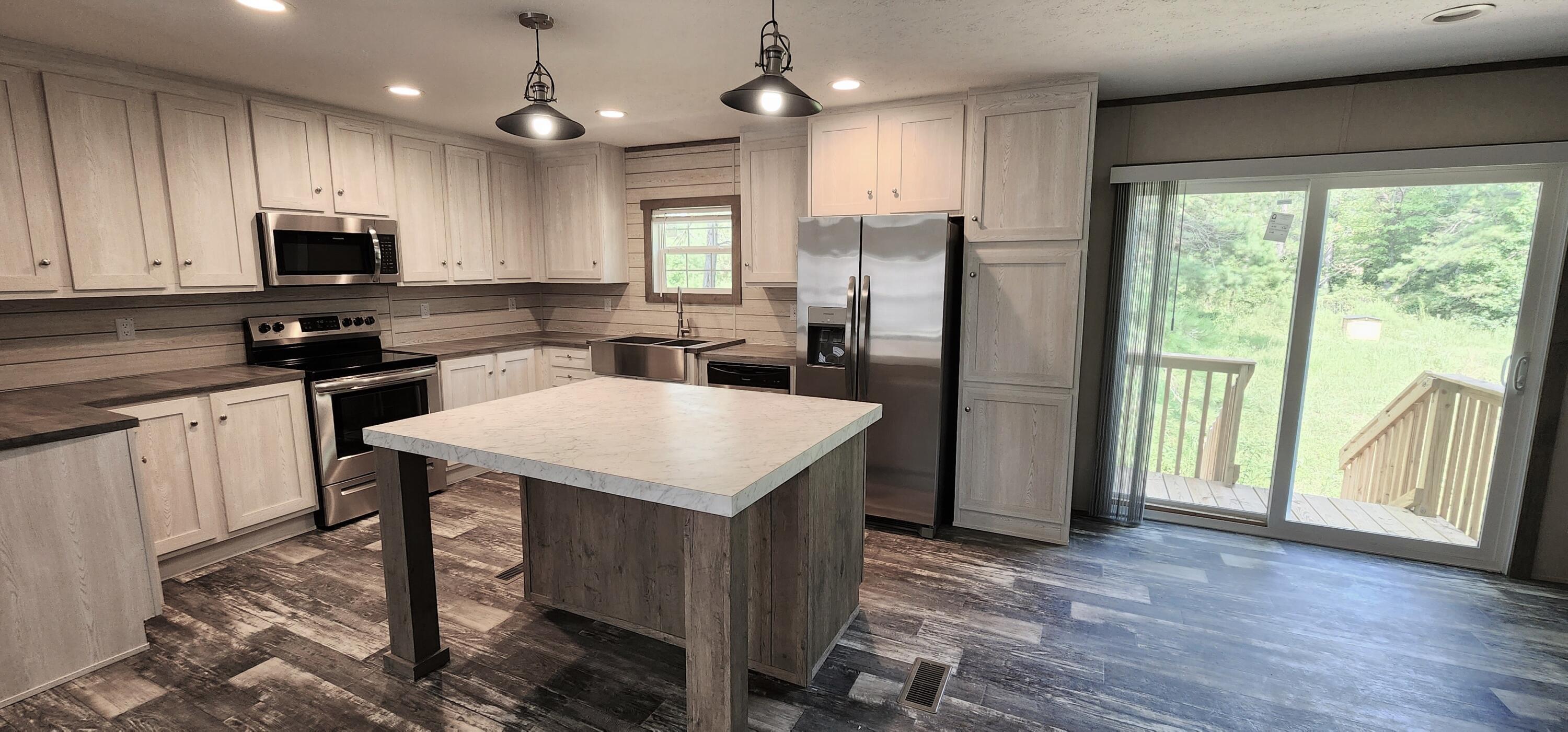 970 Tiger Loop St. Stephen, SC 29479 - Photo 2 of 9 Huge Island eating area off back door