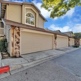 a front view of a house with a garage