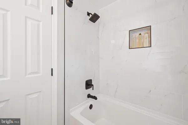 a bathroom with a bathtub