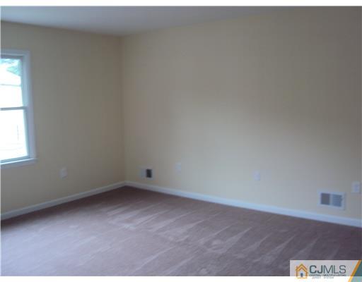 64 Helmetta Road Monroe Township, NJ 08831 - Photo 15 of 22 an empty room with a window