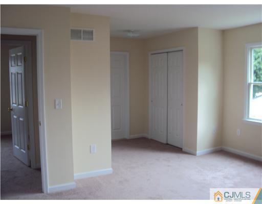 64 Helmetta Road Monroe Township, NJ 08831 - Photo 16 of 22 a view of an empty room and window