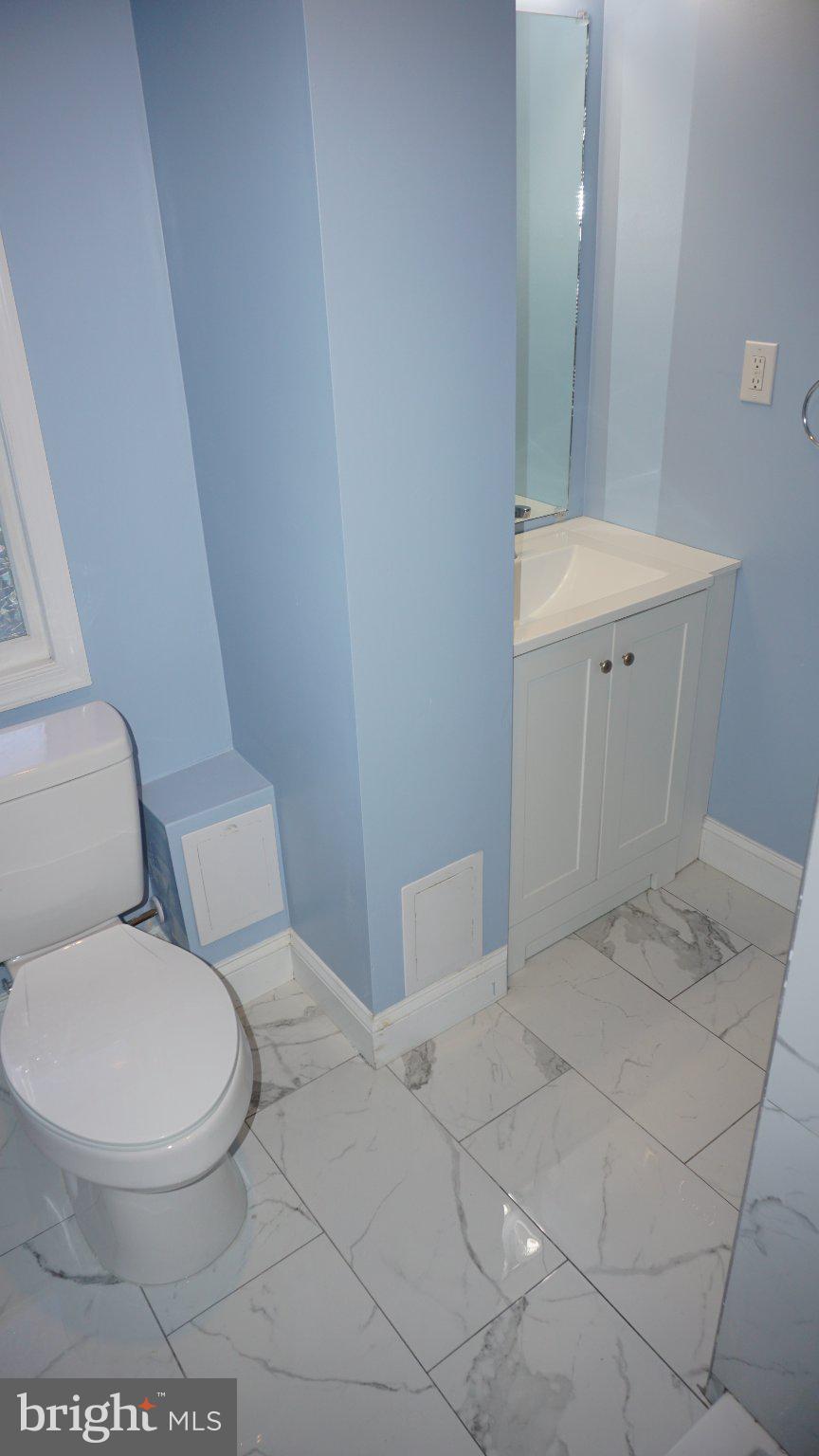 5854 Deale Churchton Road Deale, MD 20751 - Photo 25 of 57 Serene blue bathroom retreat.