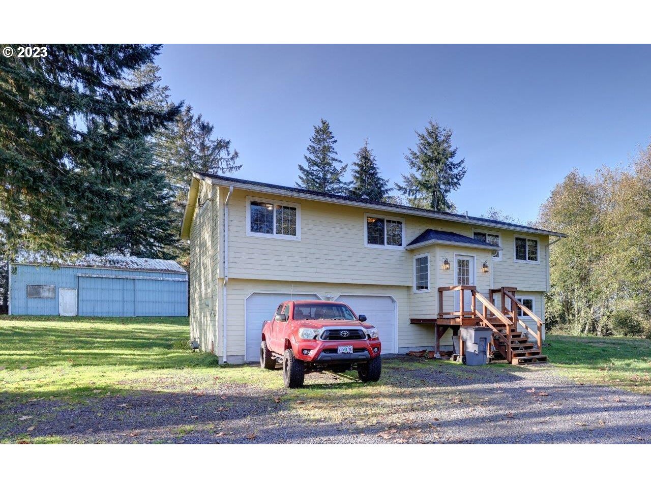 93066 Knappa Dock Road Astoria, OR 97103 - Photo 1 of 29 a front view of a house with garden